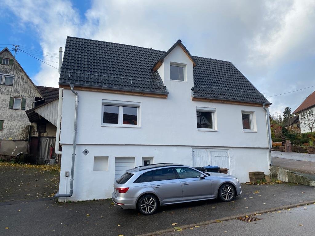  Einfamilienhaus mit Terrasse, kleine Garten und Stellplatz